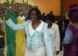 Pst Jeanette and Sister Esther holding up the flag of Gabon in El Rai church, Tel Aviv